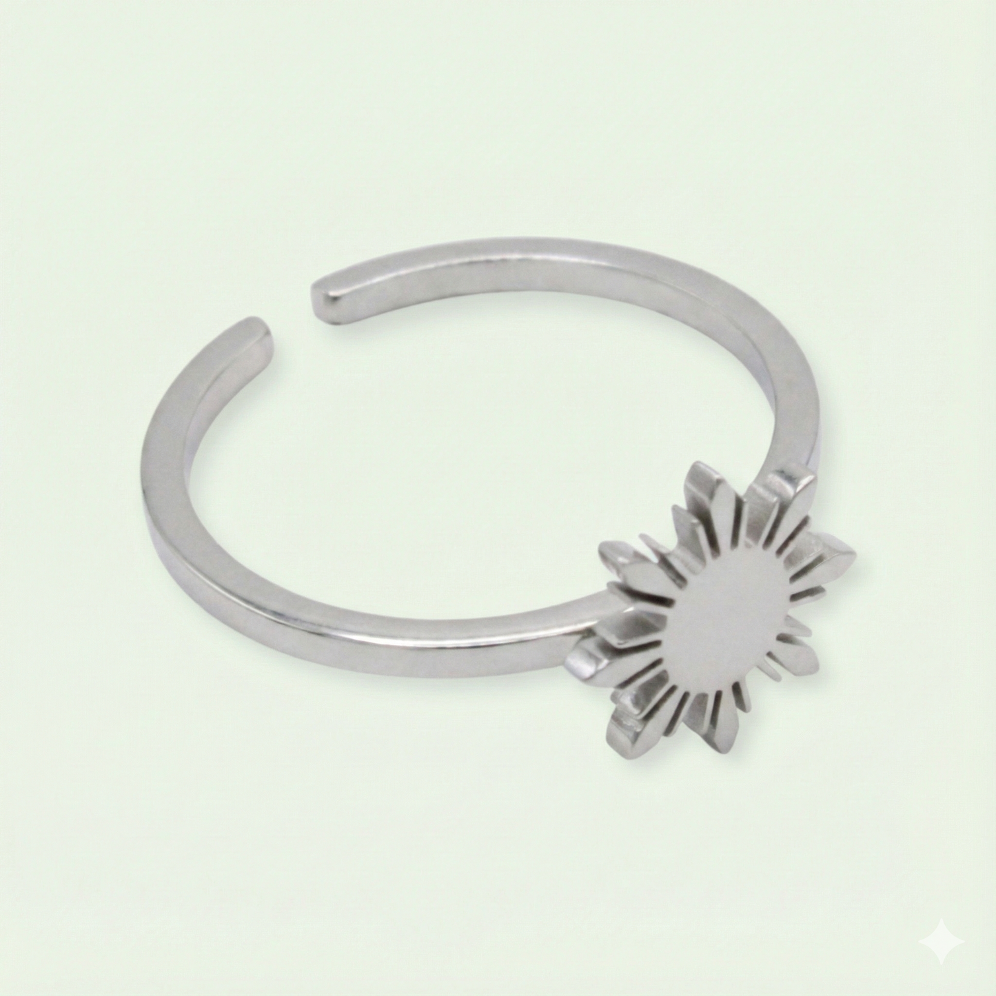 Aking Sinta Araw Adjustable Ring in silver close-up on white background, showcasing adjustable hook and 8-ray sun design craftsmanship