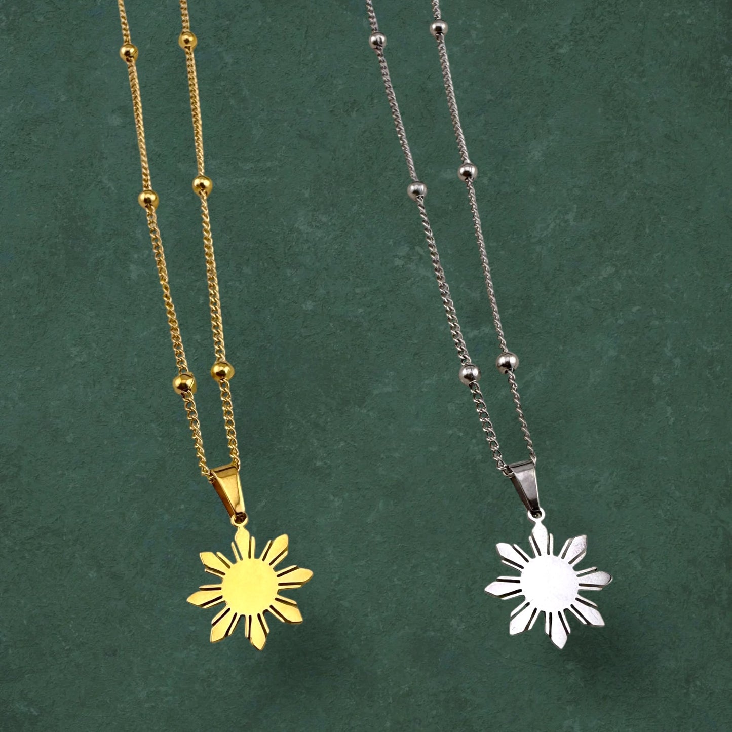 Araw satellite chain necklaces in gold, stainless steel, and silver variants, featuring minimalist sun charm pendants inspired by Filipino design