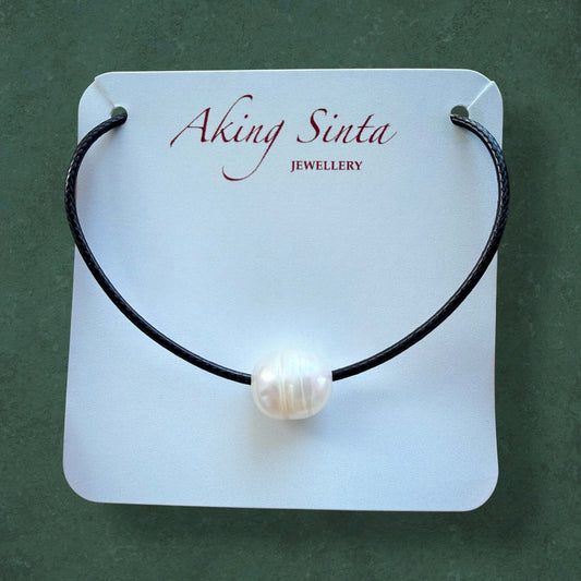 Floating Pearl Cord Necklace