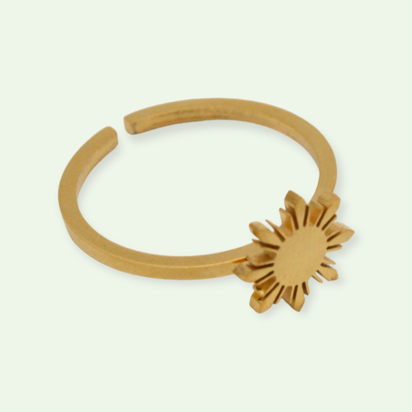 Aking Sinta Araw Adjustable Ring in gold close-up on white background, showcasing 8-ray sun design and adjustable hook craftsmanship