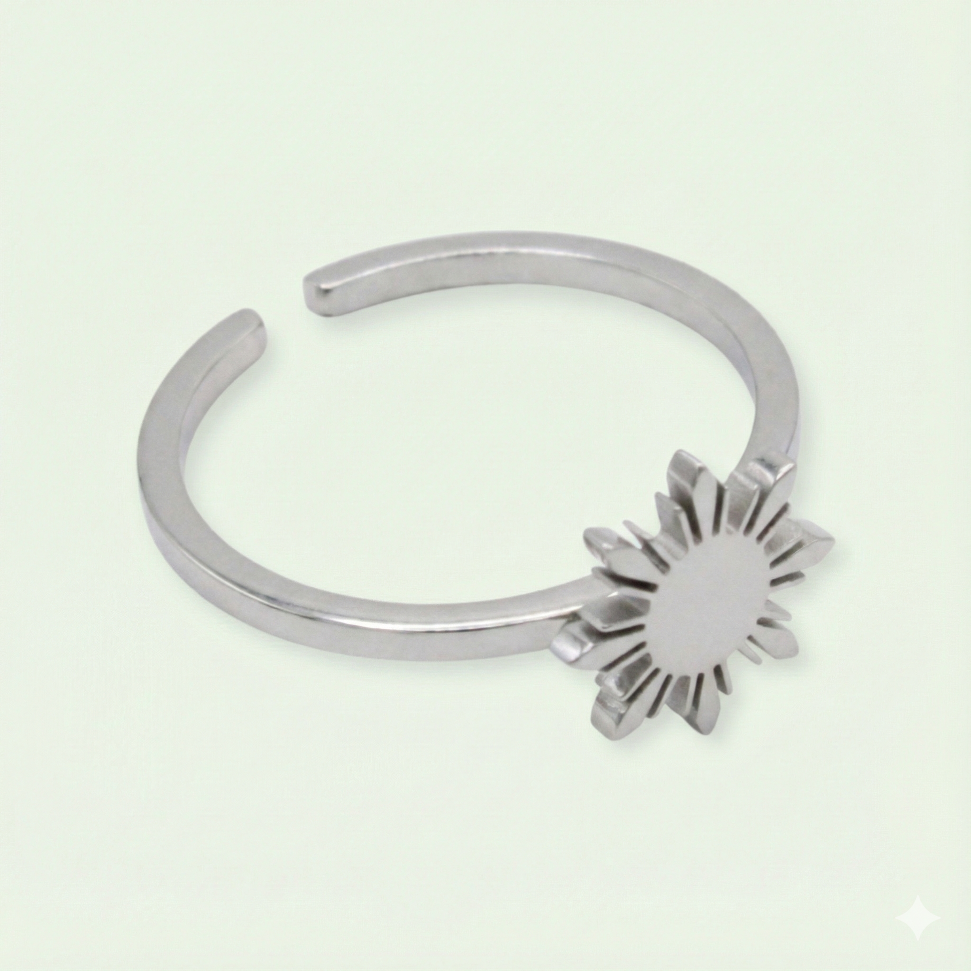 Aking Sinta Araw Adjustable Ring in silver close-up on white background, showcasing adjustable hook and 8-ray sun design craftsmanship