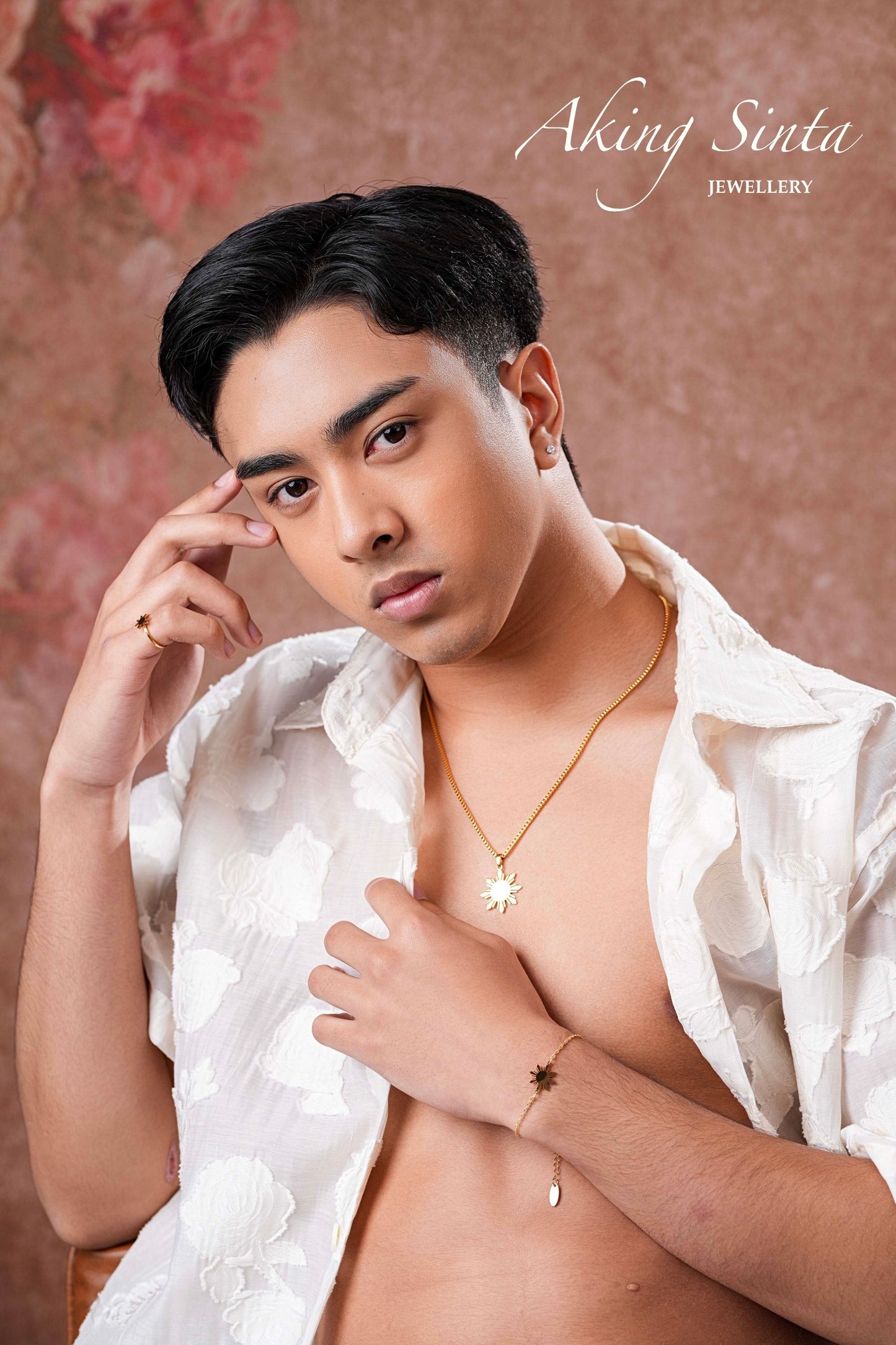 Aking Sinta Araw Chunky Box Chain Necklace in gold worn by man with short hair in short-sleeve polo