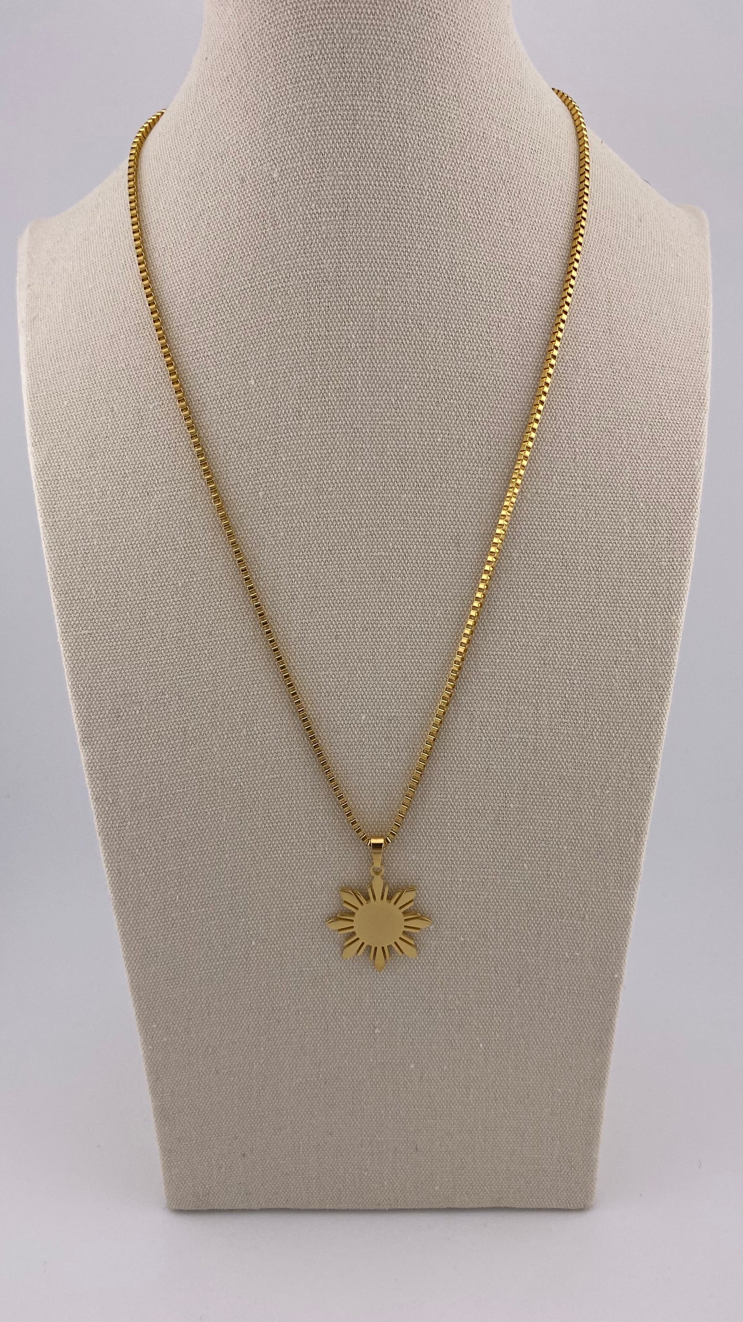 Aking Sinta Araw Chunky Box Chain Necklace in gold displayed on necklace holder