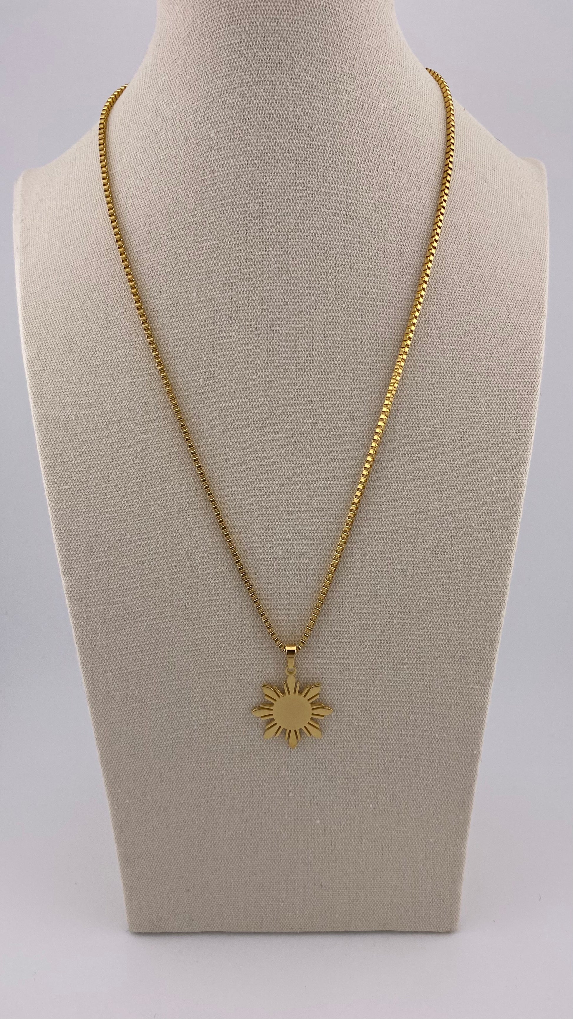 Aking Sinta Araw Chunky Box Chain Necklace in gold displayed on necklace holder