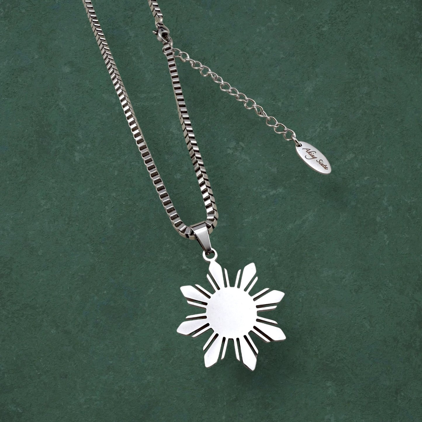 Aking Sinta Araw Chunky Box Chain Necklace in silver close-up on dark green background