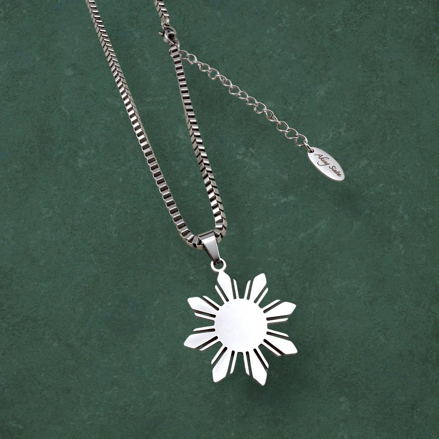 Aking Sinta Araw Chunky Box Chain Necklace in silver close-up on dark green background