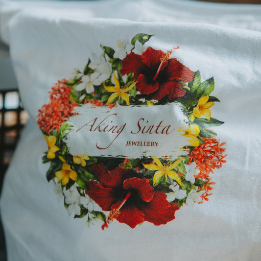 Close-up of Philippine-inspired floral print on Aking Sinta ‘BET on Yourself’ Tote Bag, featuring gumamela, yellow bell, santan, sampaguita, and ilang-ilang flowers