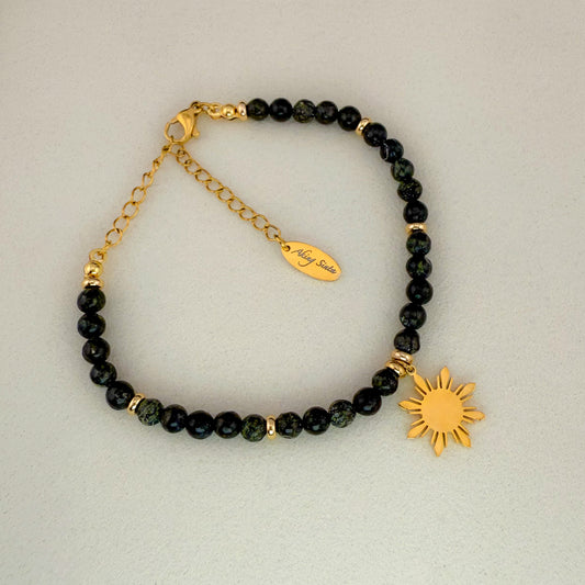 Aking Sinta Serpentine beaded bracelet featuring translucent lime-green gemstones with natural mossy inclusions, a gold 8-ray Araw sun charm, and an adjustable gold extender chain with a teardrop tag engraved with "Aking Sinta."