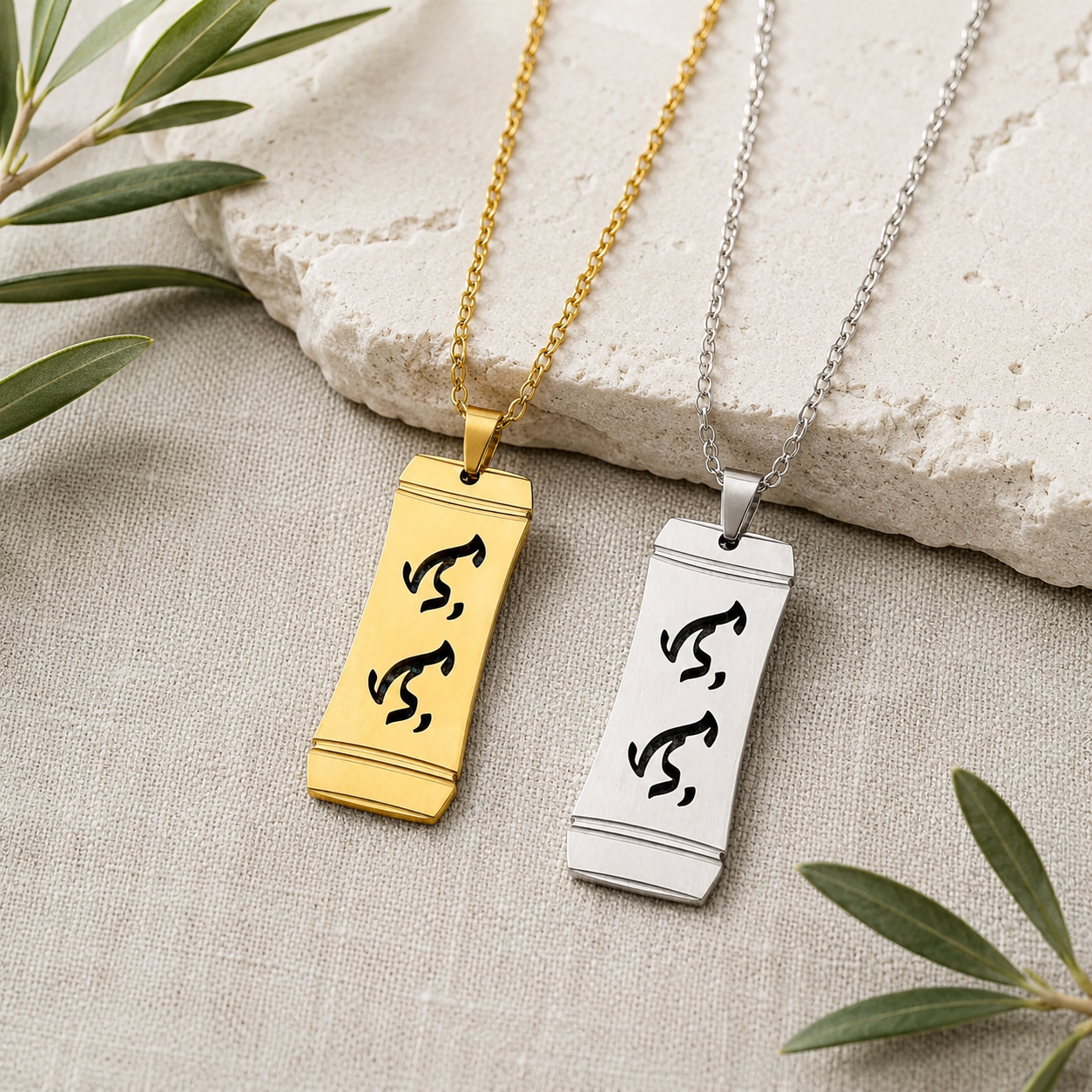 An Aking Sinta gold horizontal bar necklace centered on a textured blue-gray woven linen backdrop. The matte gold pendant features a curved bamboo frame silhouette with the word "Lolo" (Grandfather) cleanly cut out in traditional script-like Baybayin characters, suspended from a fine gold link chain.