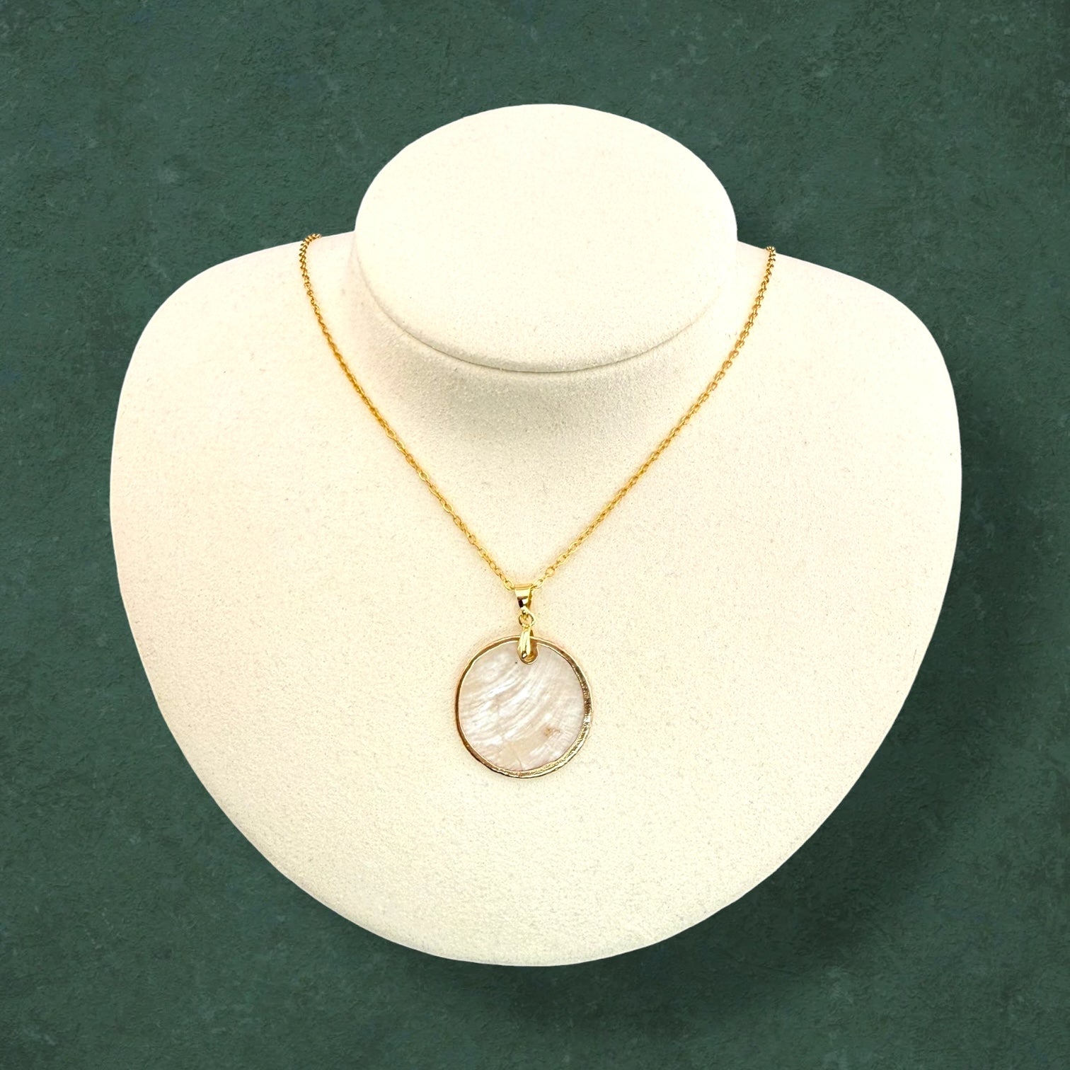 Handmade gold lined capiz necklace crafted from natural seashells, elegant beach-inspired jewelry accessory for women"