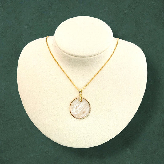 Handmade gold lined capiz necklace crafted from natural seashells, elegant beach-inspired jewelry accessory for women"