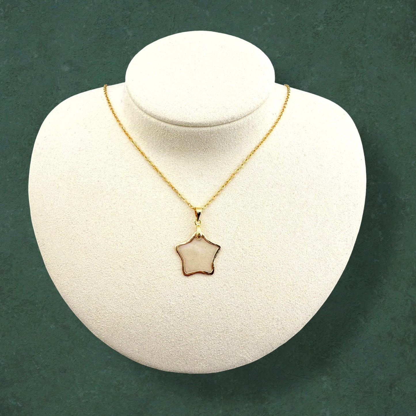 Star-shaped gold lined capiz necklace, handmade seashell jewelry pendant with beach-inspired design